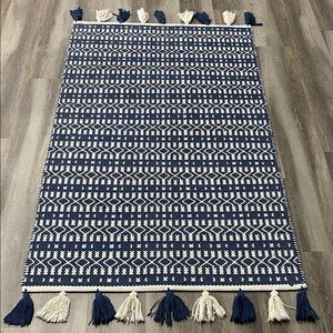 Pottery Barn handwoven Tassel Tribal Cotton area rug  size 3x5 blue ivory cream